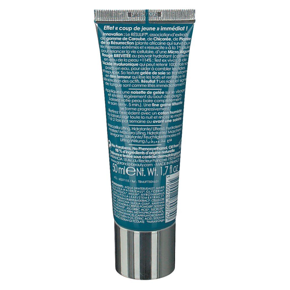 Rückseite der Tubenverpackung. Text in mehreren Sprachen. Blaue und silberne Farbgebung.