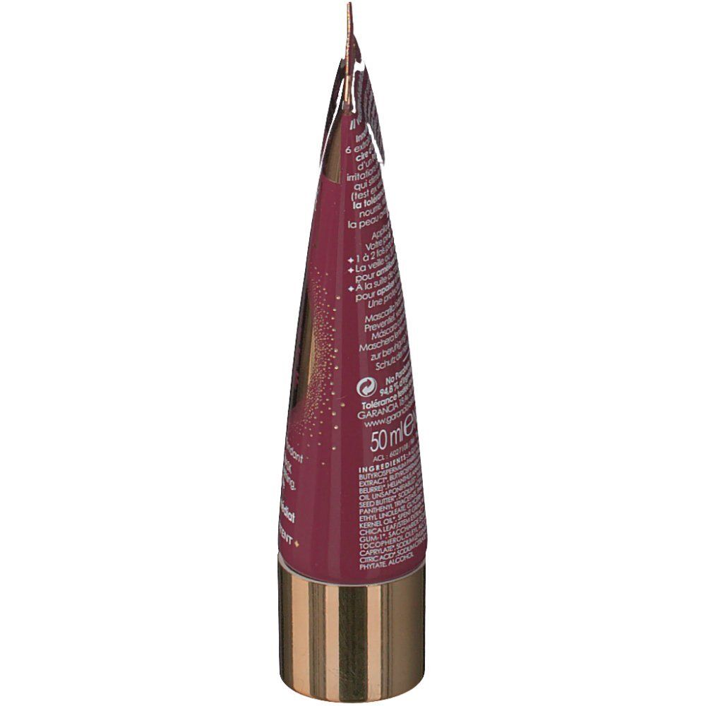 Seitenansicht des Produkttubes. Bordeauxfarbener Tube mit goldenem Verschluss. Produktname und Inhaltsstoffe sind aufgedruckt.