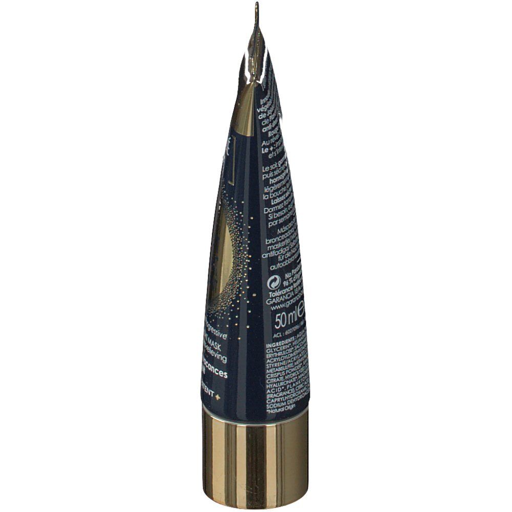 Seitenansicht des Tubus. Goldene Kappe und Verschluss. Blaue Verpackung mit Text. 50 ml.