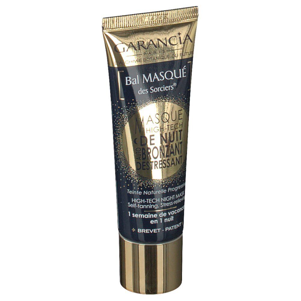Tube mit goldener Kappe. Aufschrift: Garancia, Bal Masqué des Sorciers, Masque de Nuit Autobronzant. Blaue Verpackung.