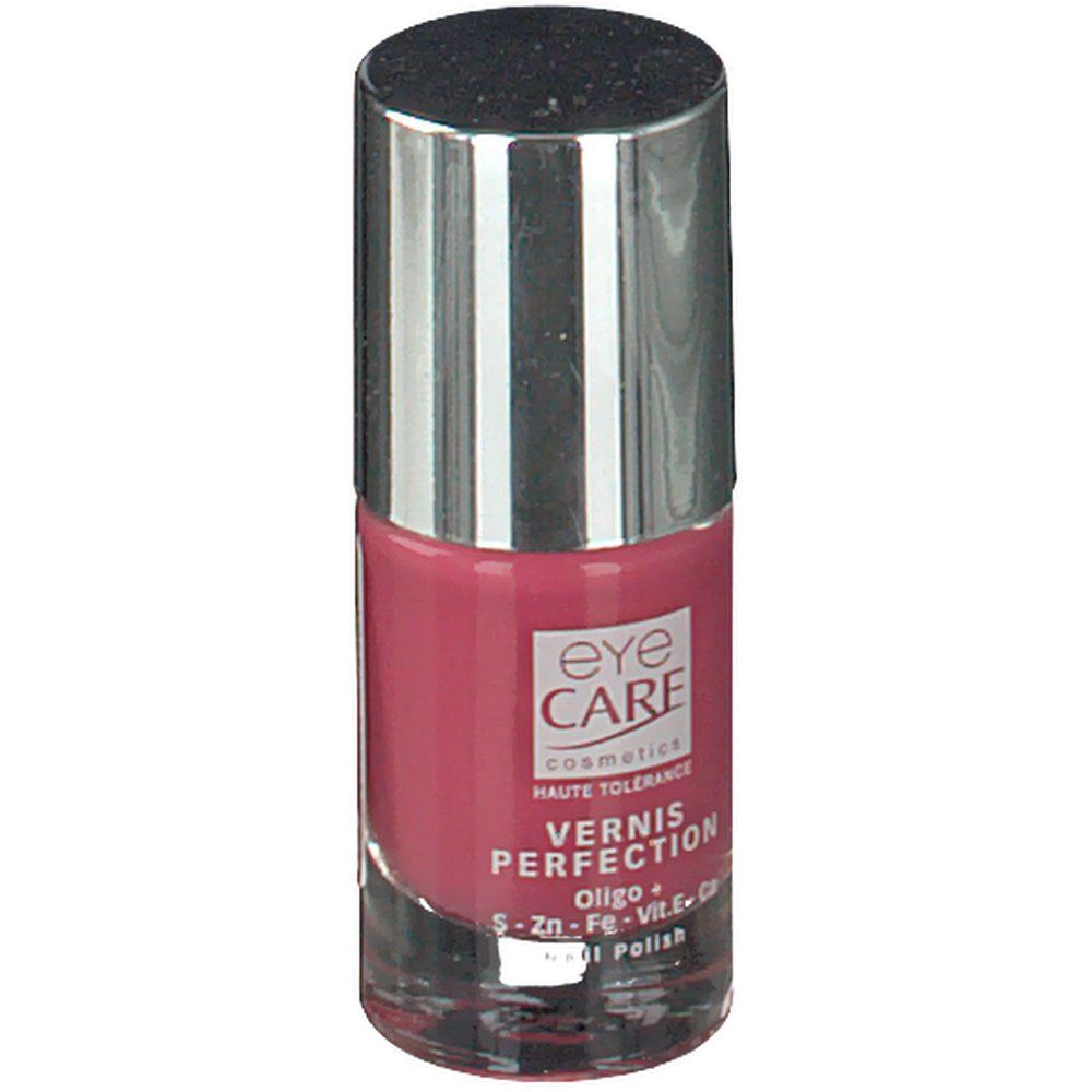 Flacon de vernis à ongles rose. Bouchon argenté. Inscriptions: eye CARE cosmetics, VERNIS PERFECTION, Oligo + S-Zn-Fe-Vit.E-Ca.