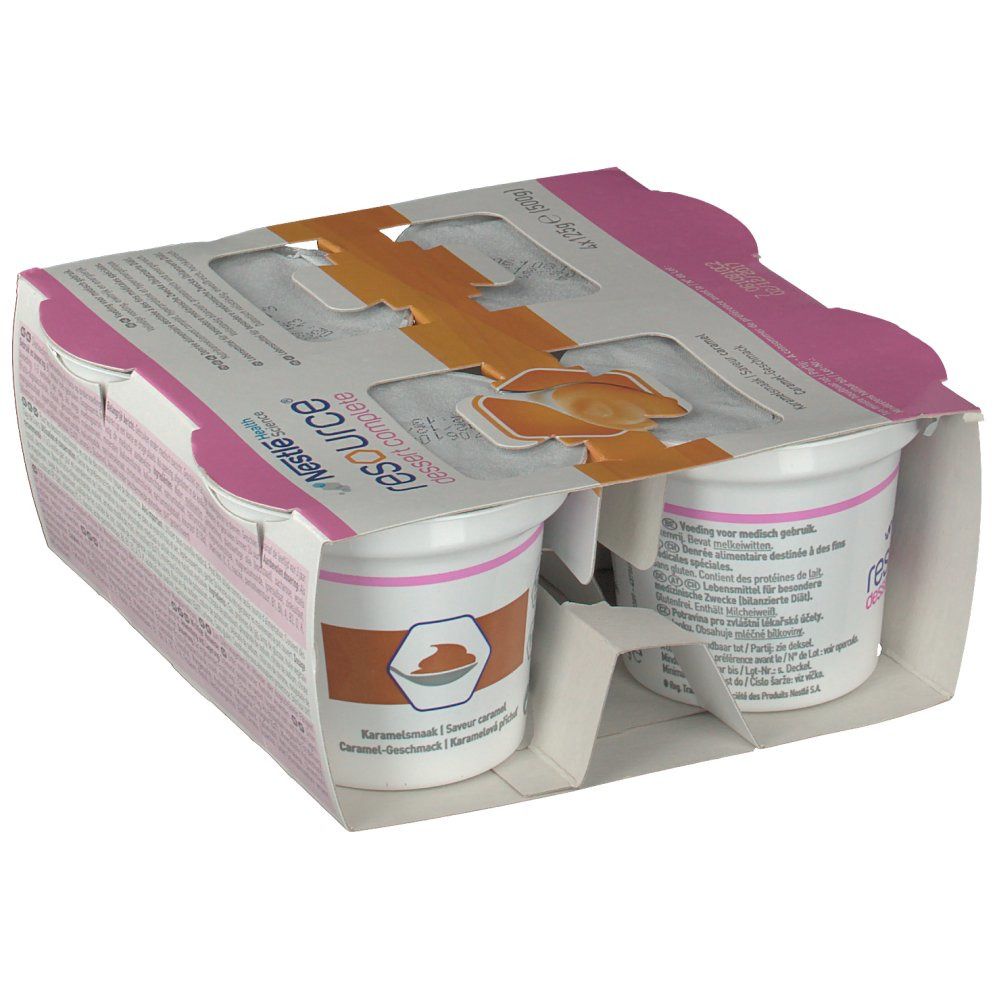 Emballage de quatre pots. Inscription: Nestle Resource Dessert Complete Caramel. Emballage rose et blanc.