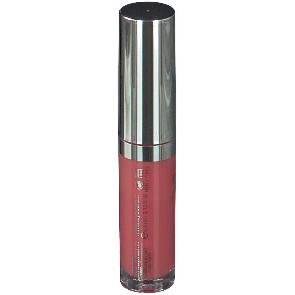 Rouge à lèvres liquide avec bouchon argenté. Inscription et numéro de lot.