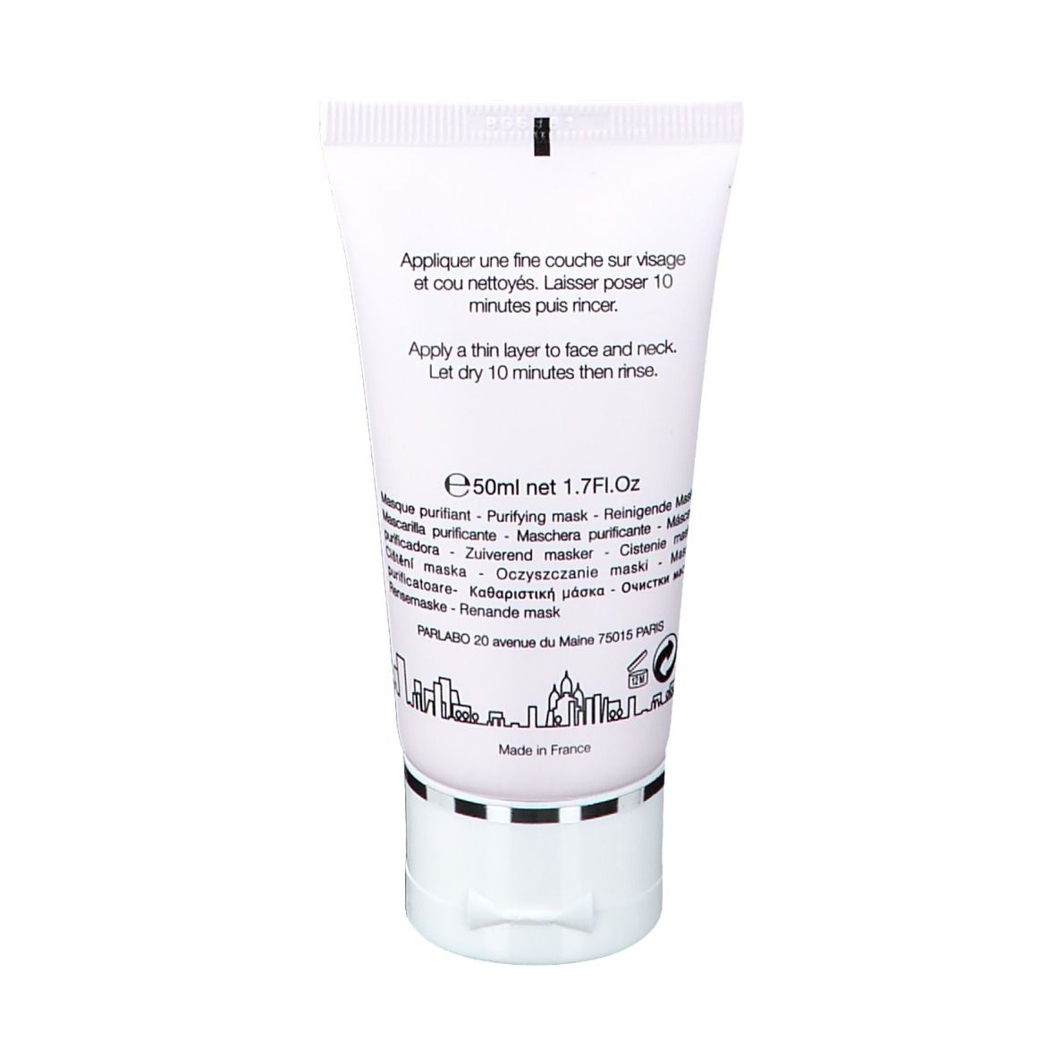 Dos du tube. Texte: instructions d'utilisation, 50ml net 1.7Fl.Oz. Silhouette de ville en bas. Fabriqué en France.