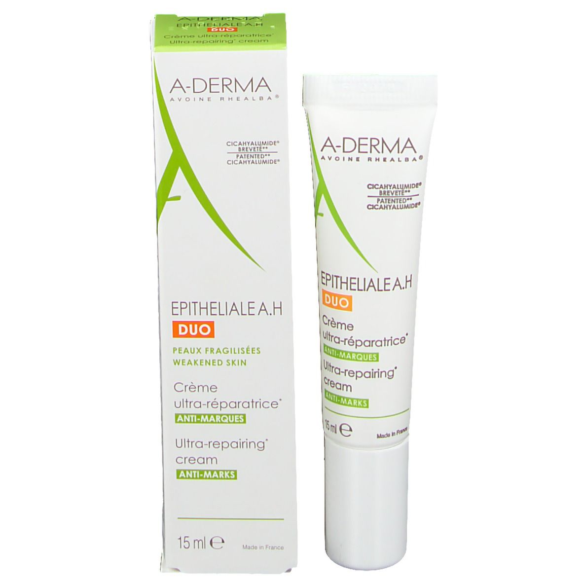 A-Derma Epitheliale A.H Duo Ultra-Repairing Cream, Tube und Schachtel. Weiße Tube, grüne und orangefarbene Beschriftung.
