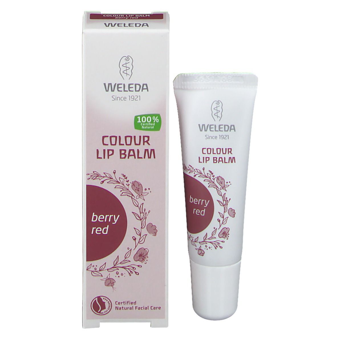 Weleda Colour Lip Balm berry red met verpakking. Tube en doos. Opschrift: Colour Lip Balm, berry red.