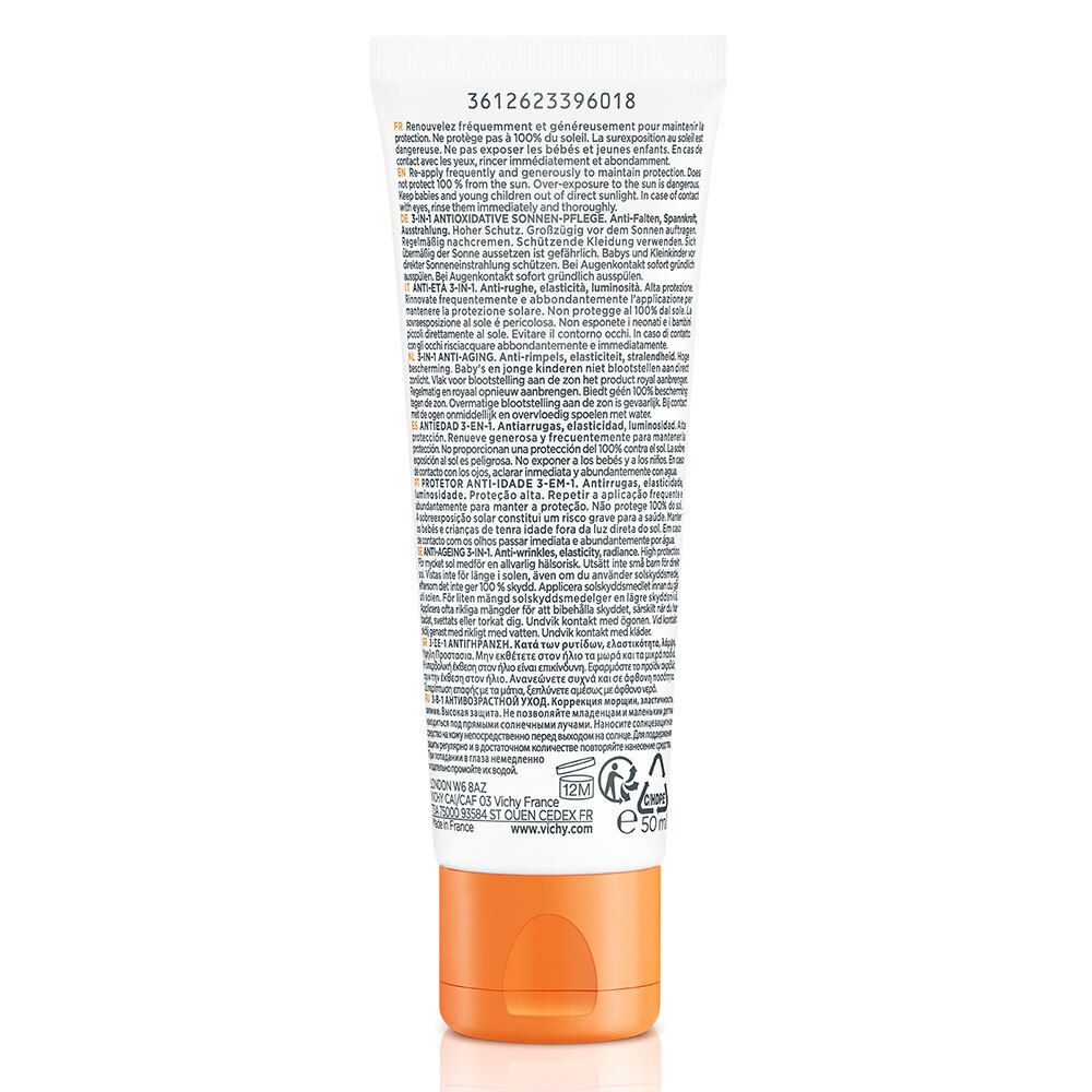 Rückseite der Tube. Text in mehreren Sprachen. Orangefarbener Deckel. Herstellerinformationen.