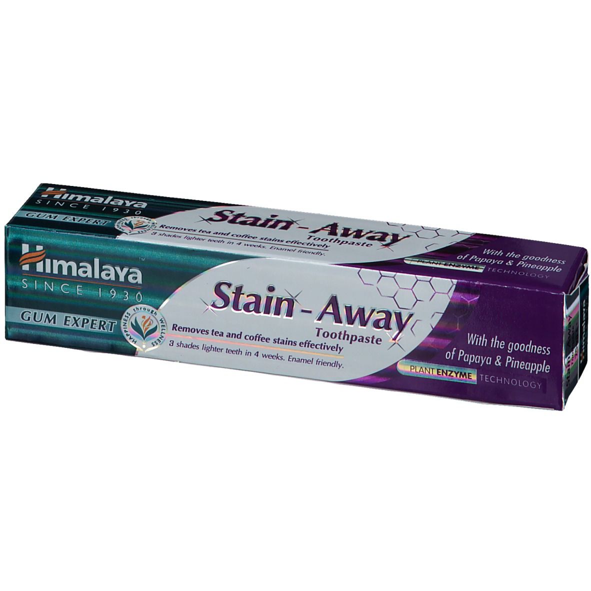 Zahnpasta-Verpackung "Himalaya Stain-Away". Grün-lila Schachtel. Entfernt Tee- und Kaffeeflecken. Enthält Papaya & Ananas.