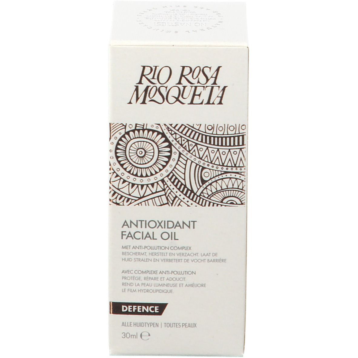 Emballage carton avec inscription : Rio Rosa Mosqueta, Antioxidant Facial Oil, Defence. Avec motif décoratif et informations produit.