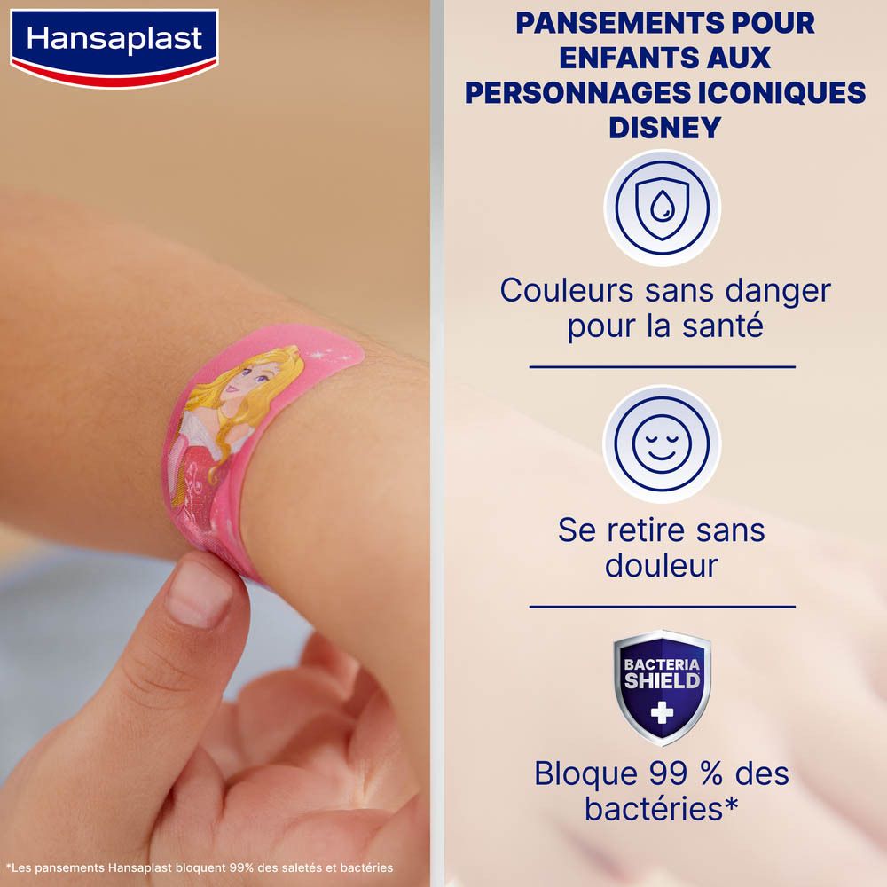Bras avec pansement. Motif Princesses Disney. Texte : couleurs sûres, retrait sans douleur, protection bactérienne.