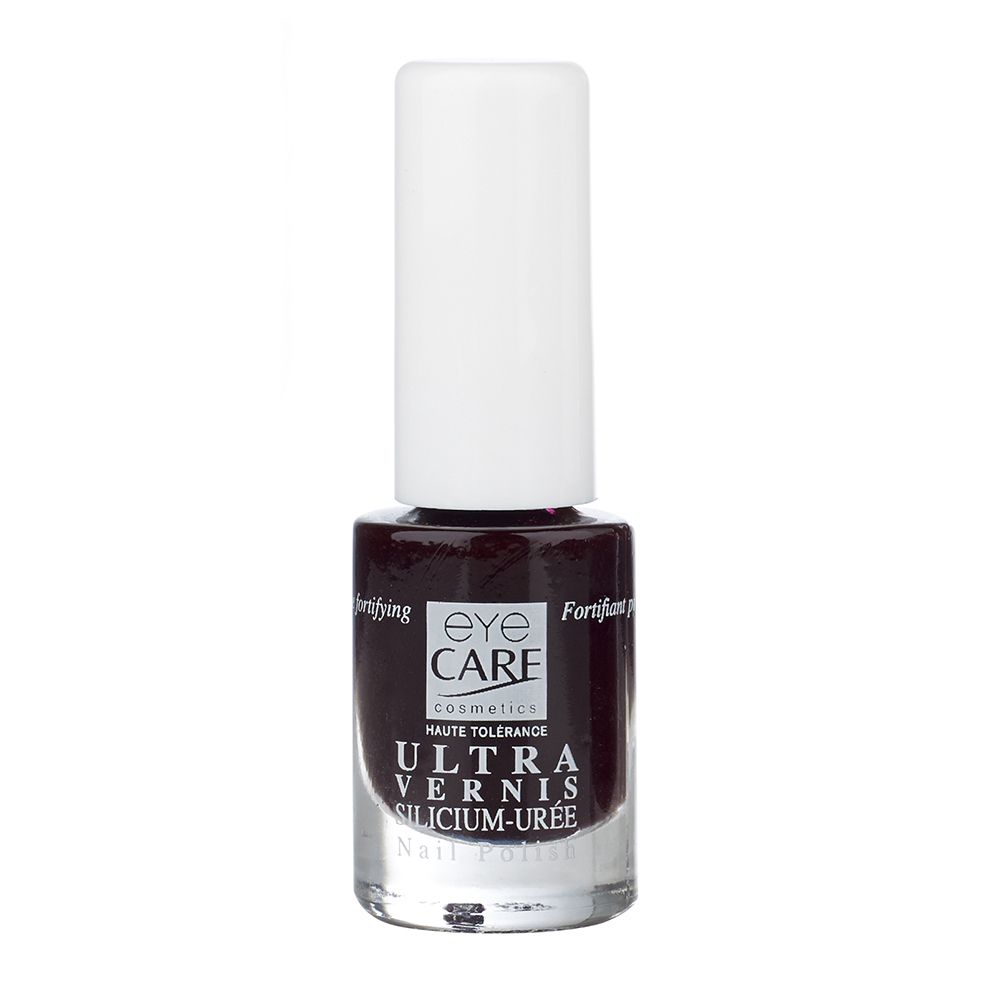 Nagellakflesje met witte dop. Donkerrode nagellak. Opschrift: EYE CARE, Ultra Vernis, Silicium-Urée, Nail Polish.