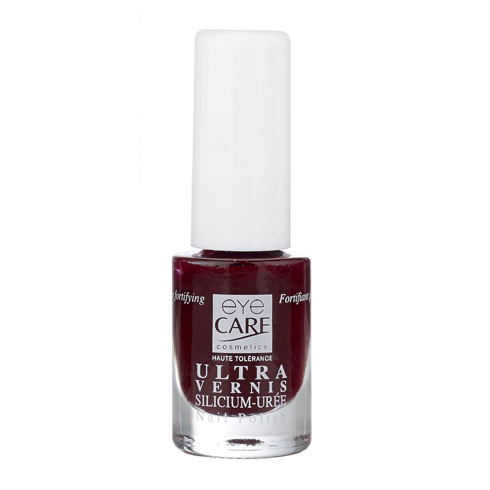 Flacon de vernis à ongles avec bouchon blanc. Vernis rouge foncé. Inscription: EYE CARE, ULTRA VERNIS, SILICIUM-UREE.