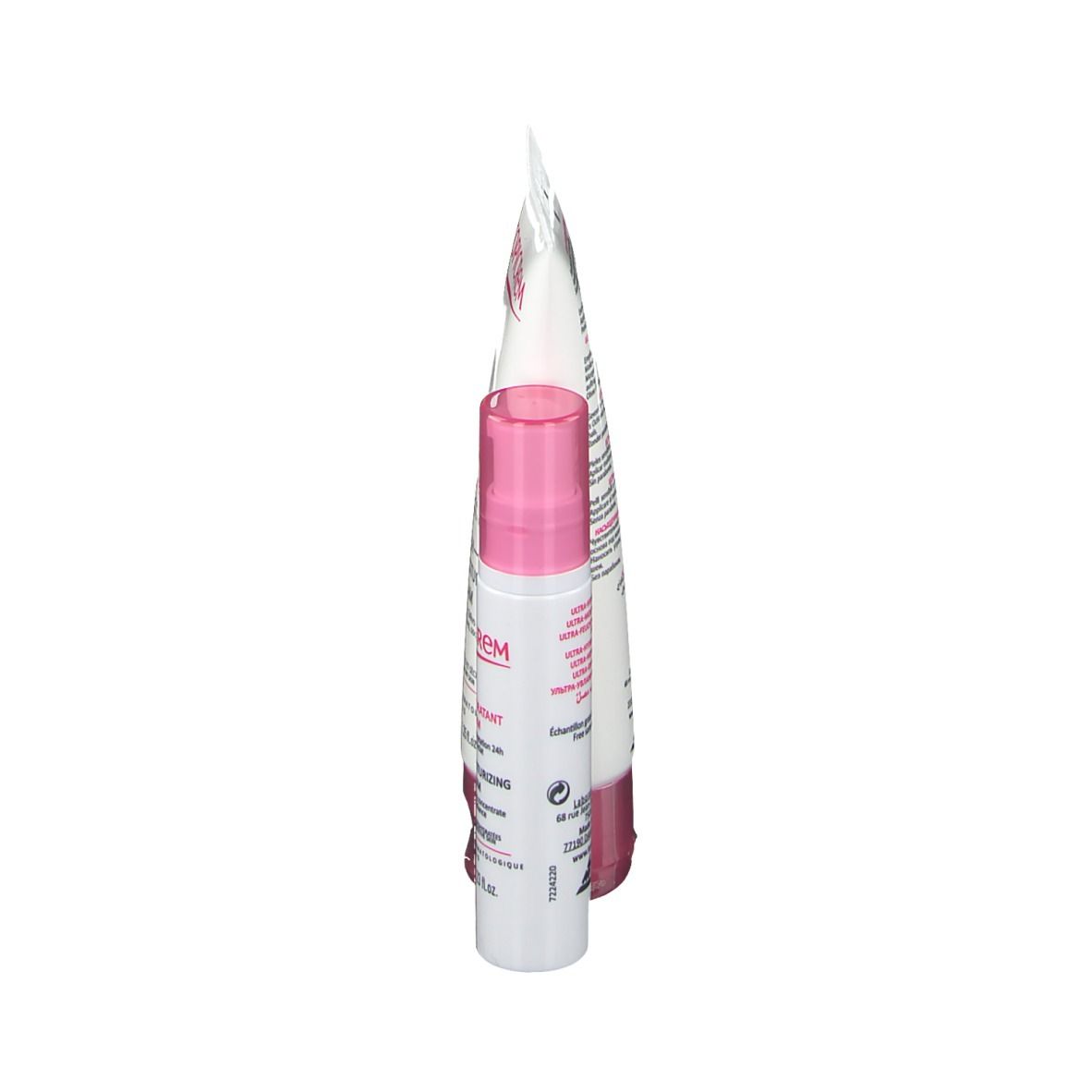 Vue latérale du tube de crème et du flacon de sérum. Blanc avec accents roses. Texte visible.