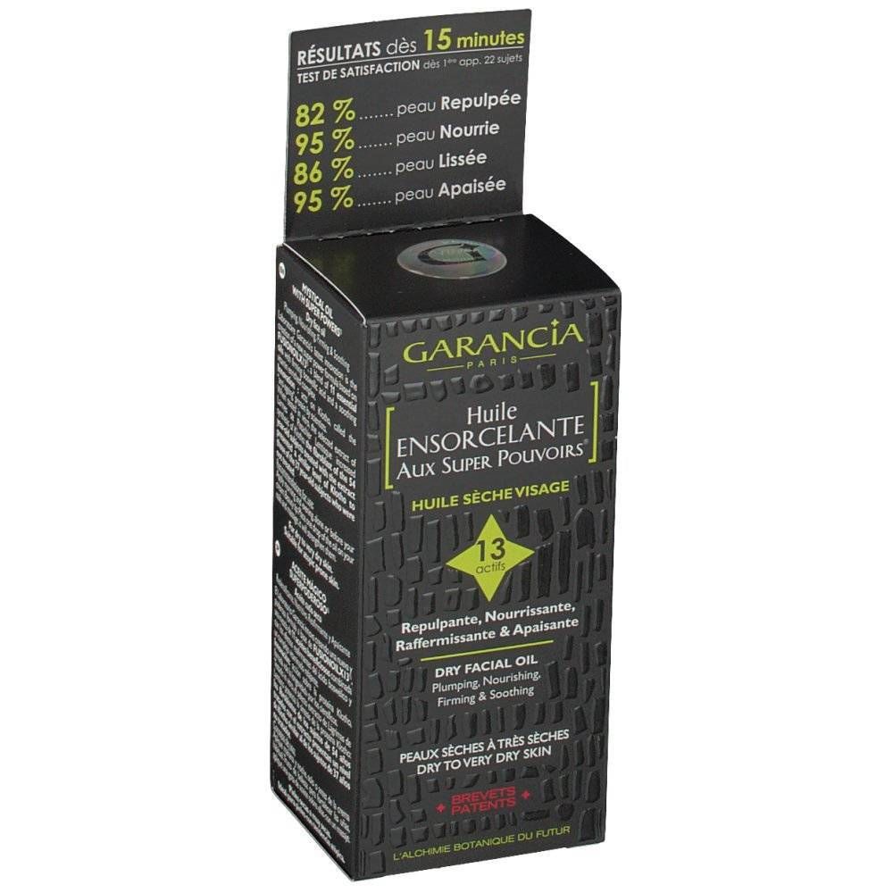 Schwarze Produktverpackung mit Text. Oben: Testergebnisse. Mitte: Produktname und -beschreibung. Unten: Für trockene Haut.