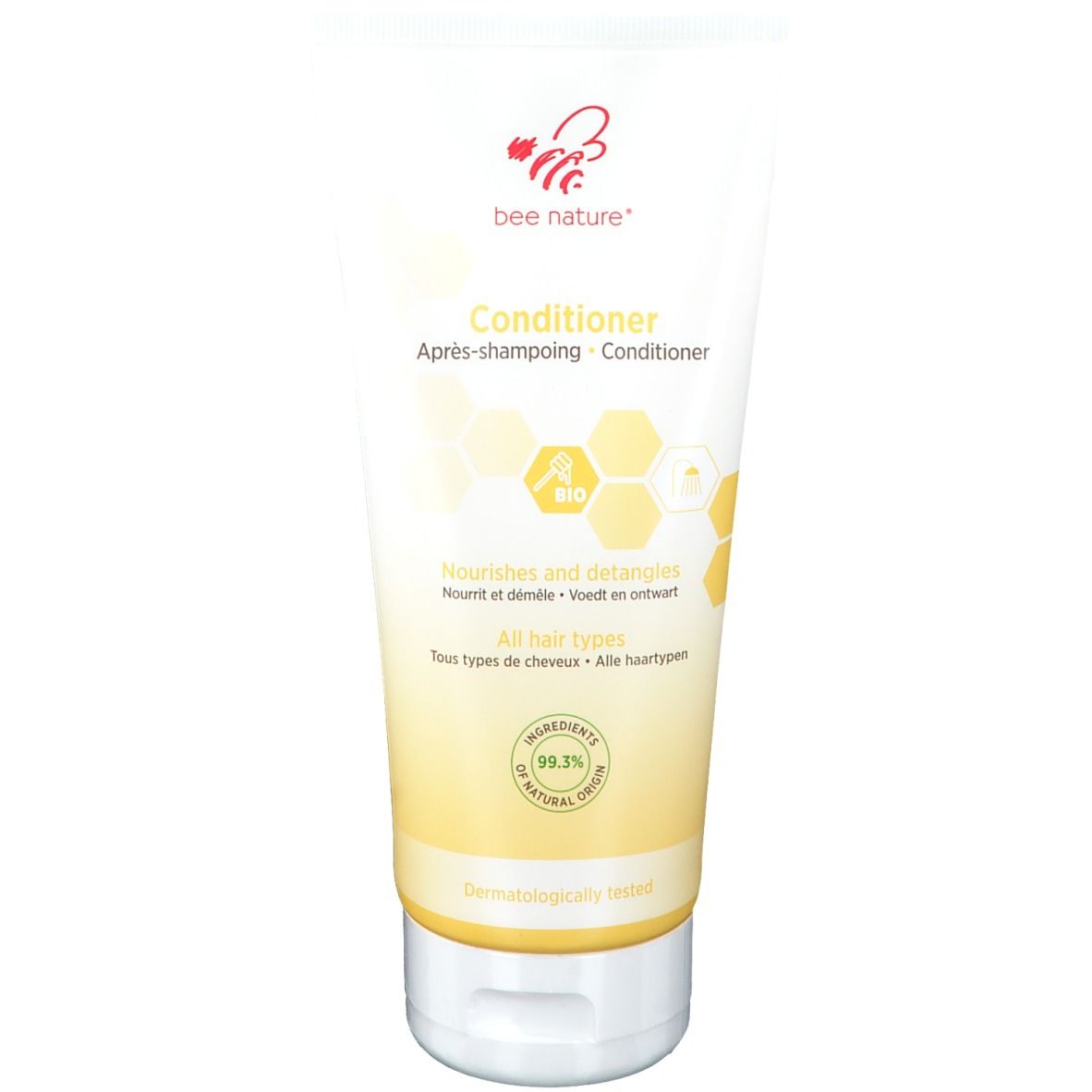 Crèmetube met productnaam en logo. Opschrift: Conditioner. Bevat 99,3% natuurlijke ingrediënten.