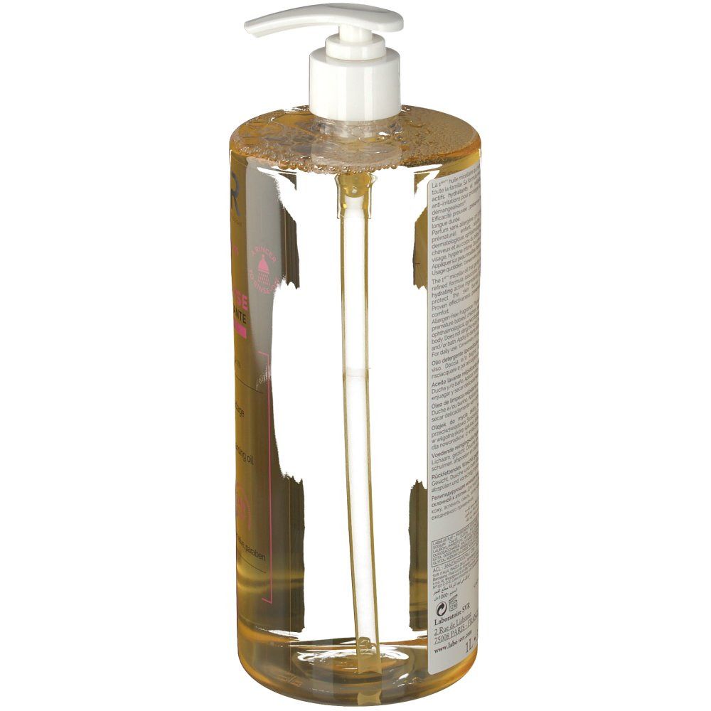 Transparente Flasche mit weißem Pumpverschluss. Etikett mit Produktinformationen. Flüssigkeit sichtbar. Perspektivische Ansicht.