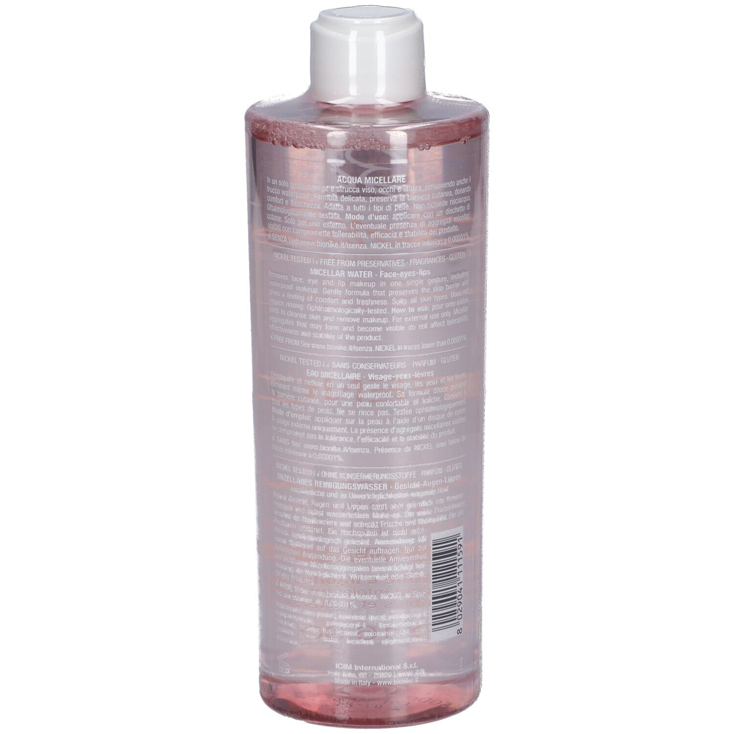 Transparente Flasche mit rosa Flüssigkeit. Weißer Deckel. Etikett mit Text und Barcode.
