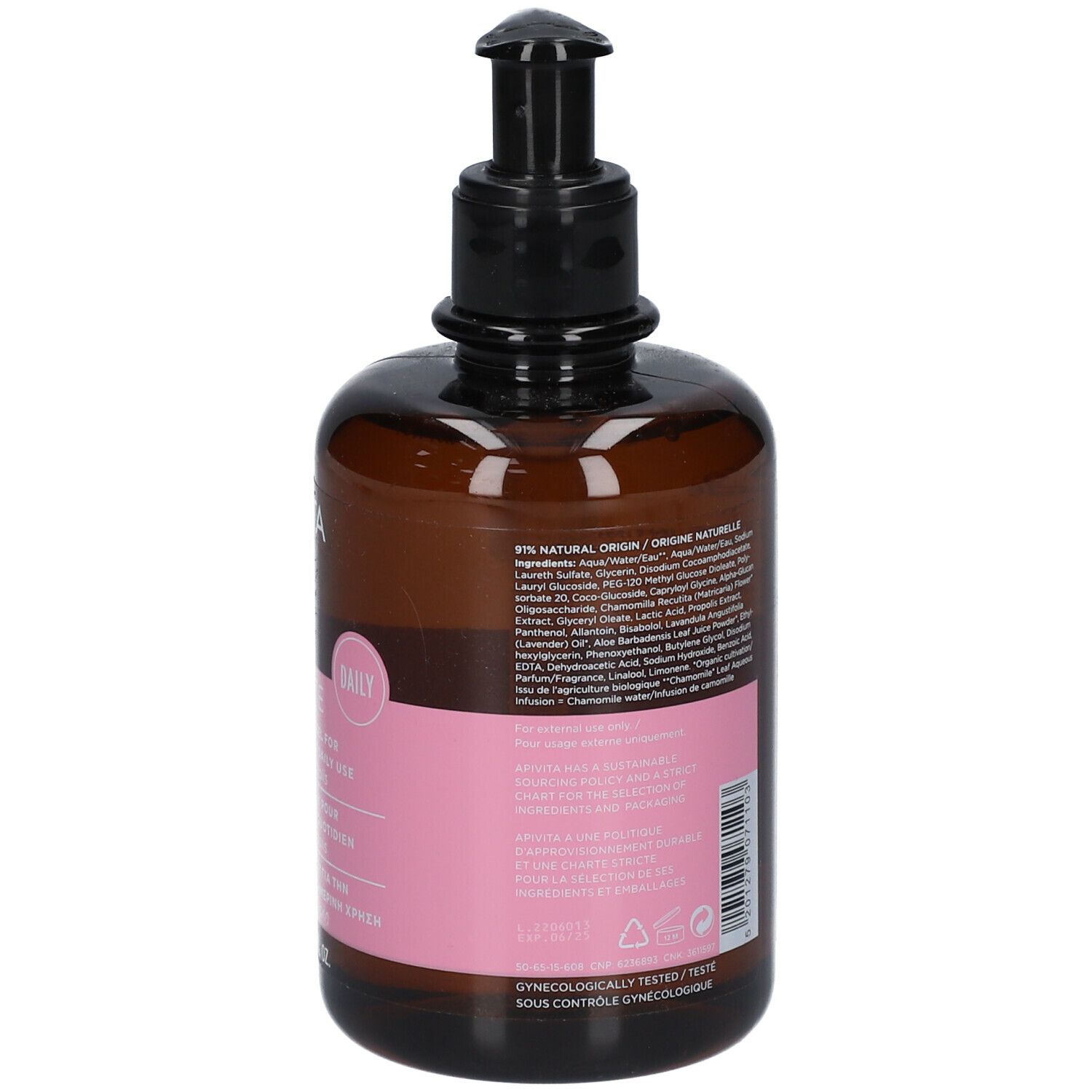 Flacon brun avec pompe noire. Étiquette rose avec informations produit. Vue arrière. Texte : ingrédients, testé dermatologiquement.