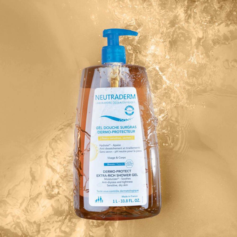Neutraderm douchegelfles met blauwe pomp, in water. Opschrift: Gel Douche Surgras Dermo-Protecteur. 1L.