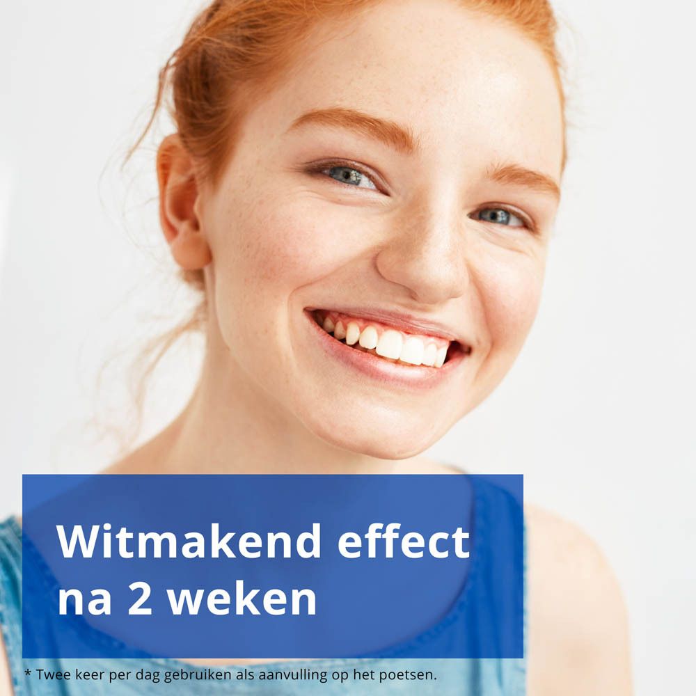Lachende vrouw. Tekst: Witmakend effect na 2 weken. *Twee keer per dag gebruiken als aanvulling op het poetsen.