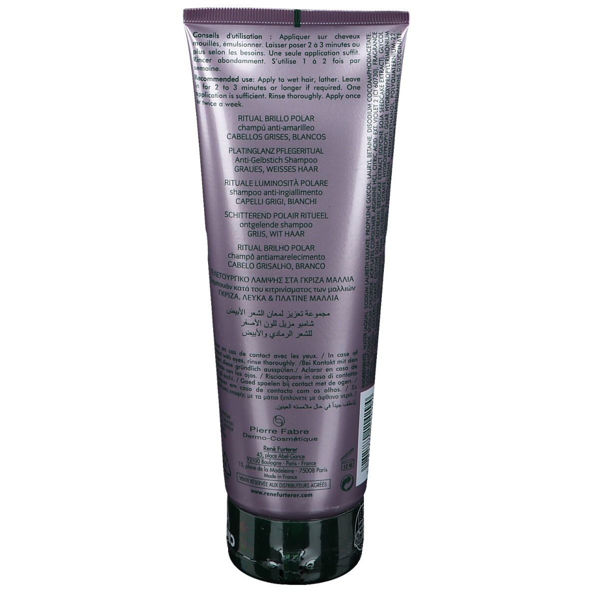Tube de shampooing argenté, lilas-gris. Texte multilingue, dont « RITUAL BRILLO POLAR ». Bouchon noir.
