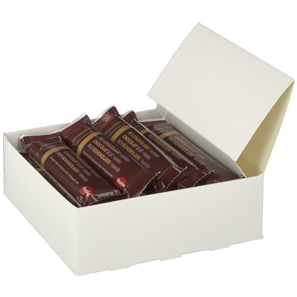 Open witte doos met meerdere chocoladerepen in bruine verpakking. Merk: Prodia.