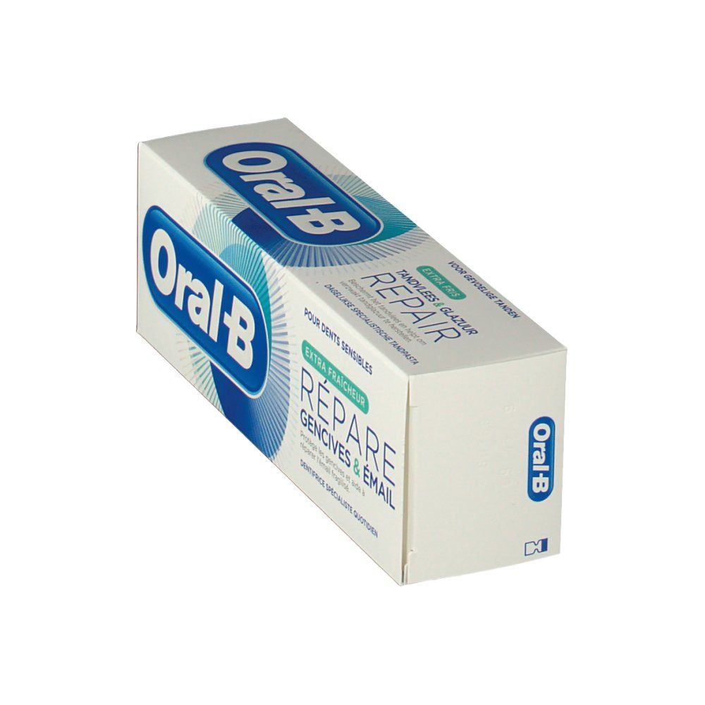 Emballage de dentifrice. Blanc, bleu. Inscriptions: Oral-B, REPARE, pour dents sensibles. Extra fraîcheur.