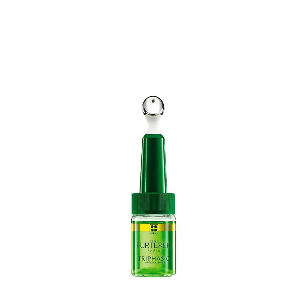 Groene fles met applicator. Bevat het product Triphasic Progressive Pflegeritual bei Haarausfall.