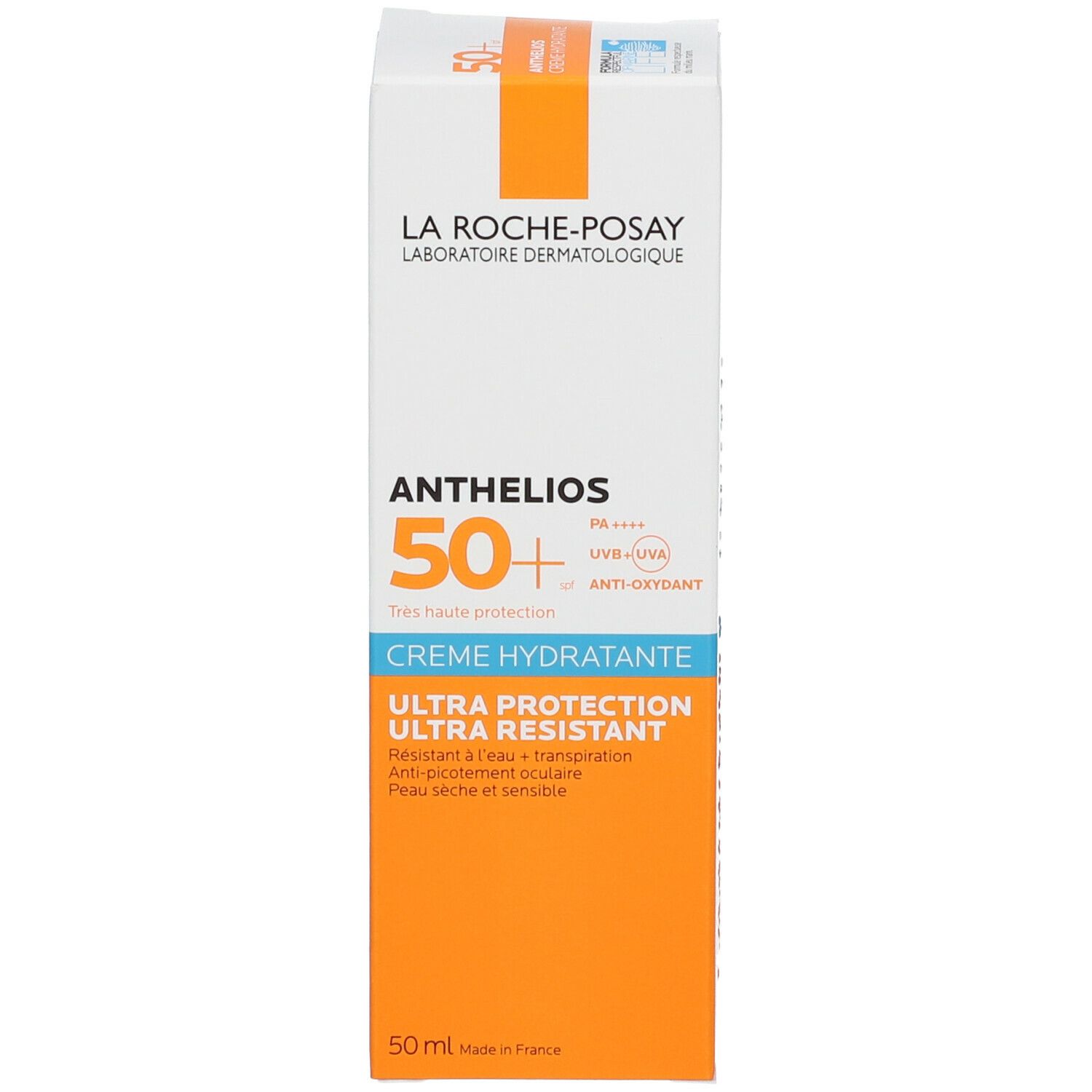 Emballage de la crème Anthelios 50+. Boîte blanche avec design orange et bleu. Nom du produit et marque.