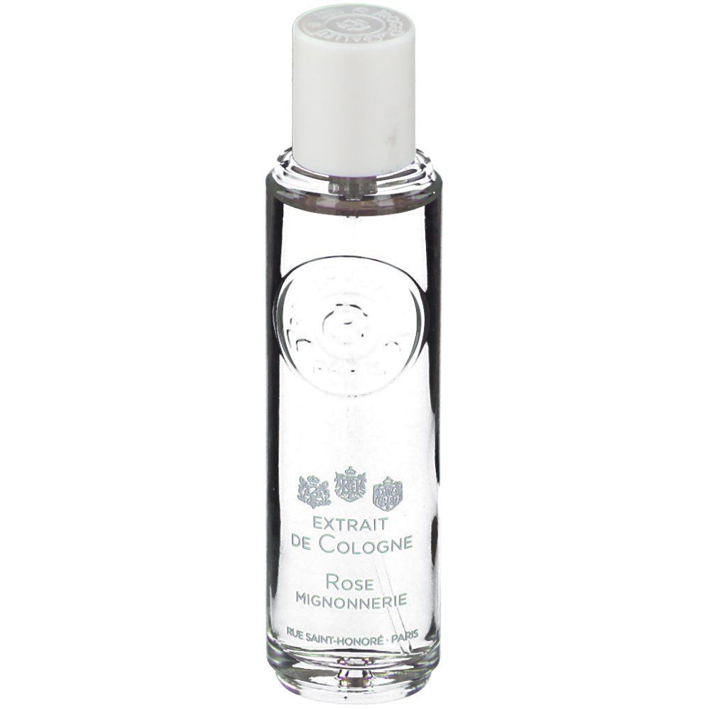 Flacon transparent avec bouchon blanc. Inscriptions: EXTRAIT DE COLOGNE, Rose Mignonnerie, Rue Saint-Honoré Paris. Logo en haut.