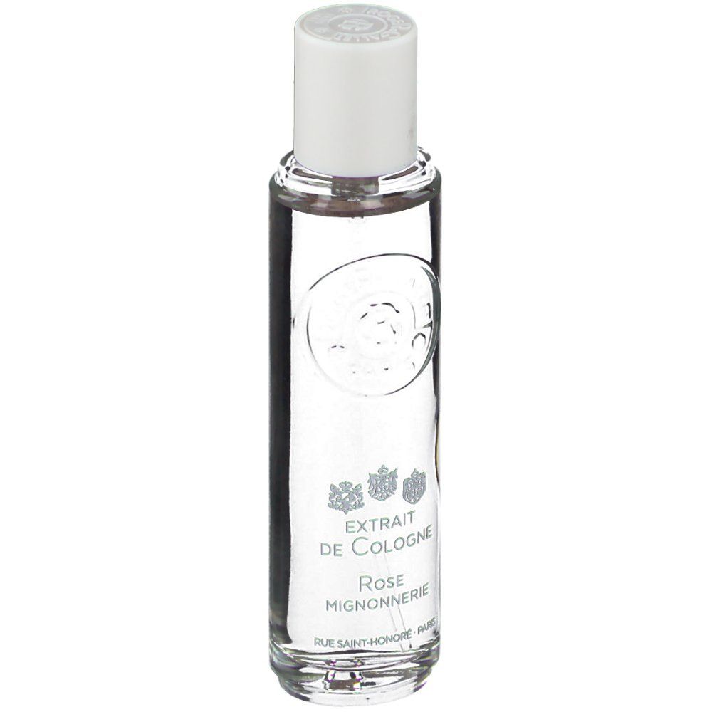 Flacon transparent avec bouchon blanc. Inscriptions: EXTRAIT DE COLOGNE, Rose Mignonnerie, Rue Saint-Honoré Paris. Logo en haut.