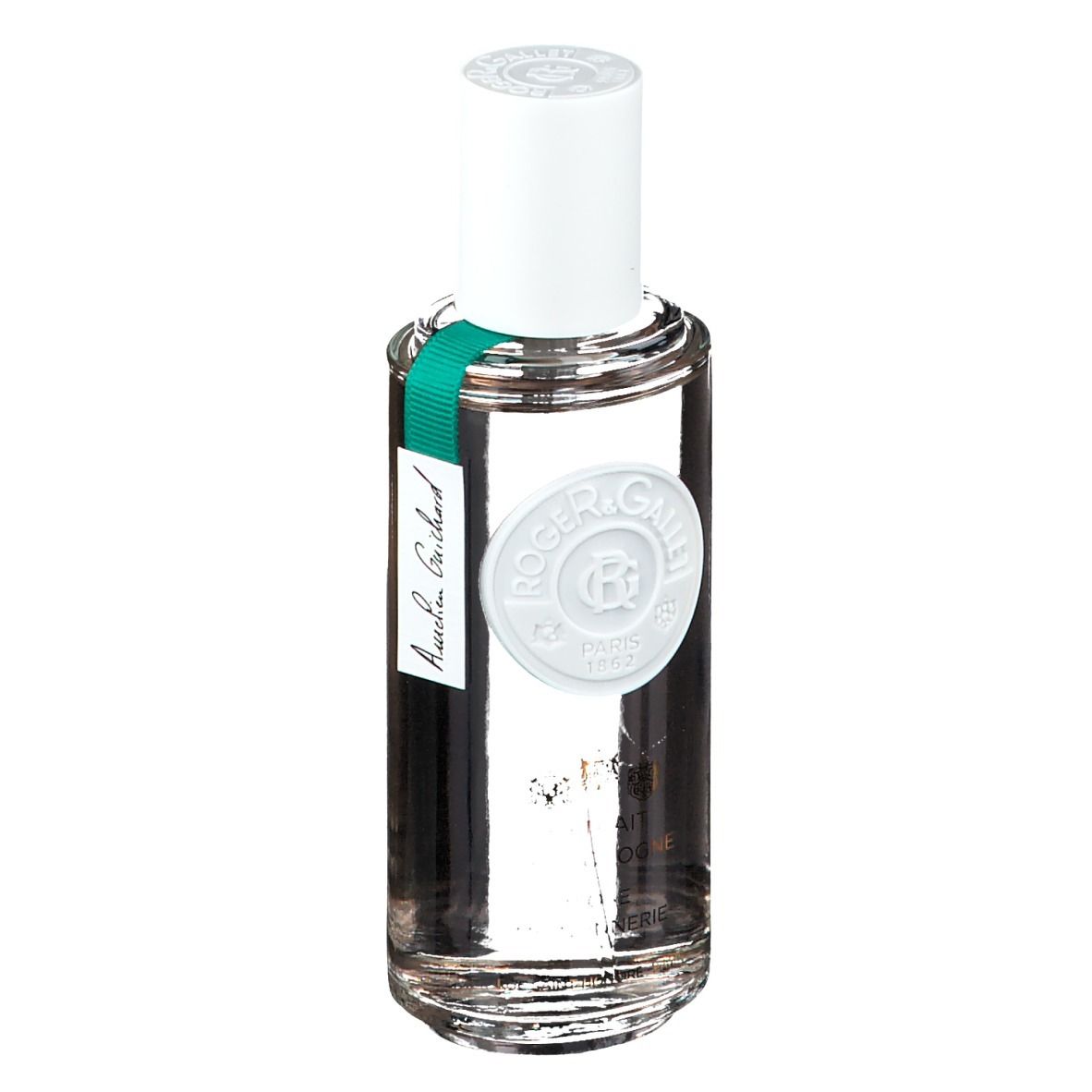 Flacon transparent avec bouchon blanc et étiquette. Inscription : ROGER & GALLET PARIS 1862. Étiquette verte avec nom.