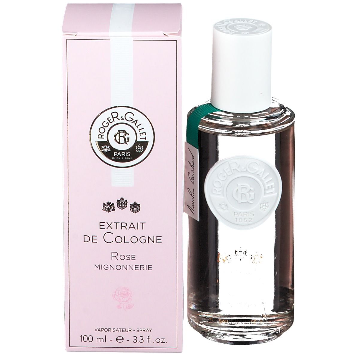Boîte et flacon roses. Inscription : EXTRAIT DE COLOGNE Rose Mignonnerie. Flacon avec bouchon blanc et étiquette.