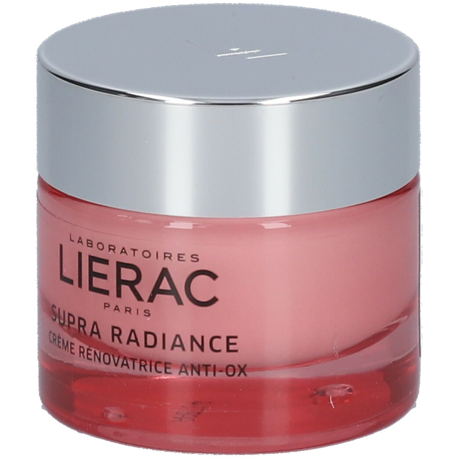 Rosa Creme in einem Glasbehälter mit silbernem Deckel. Aufschrift: LIERAC Supra Radiance.