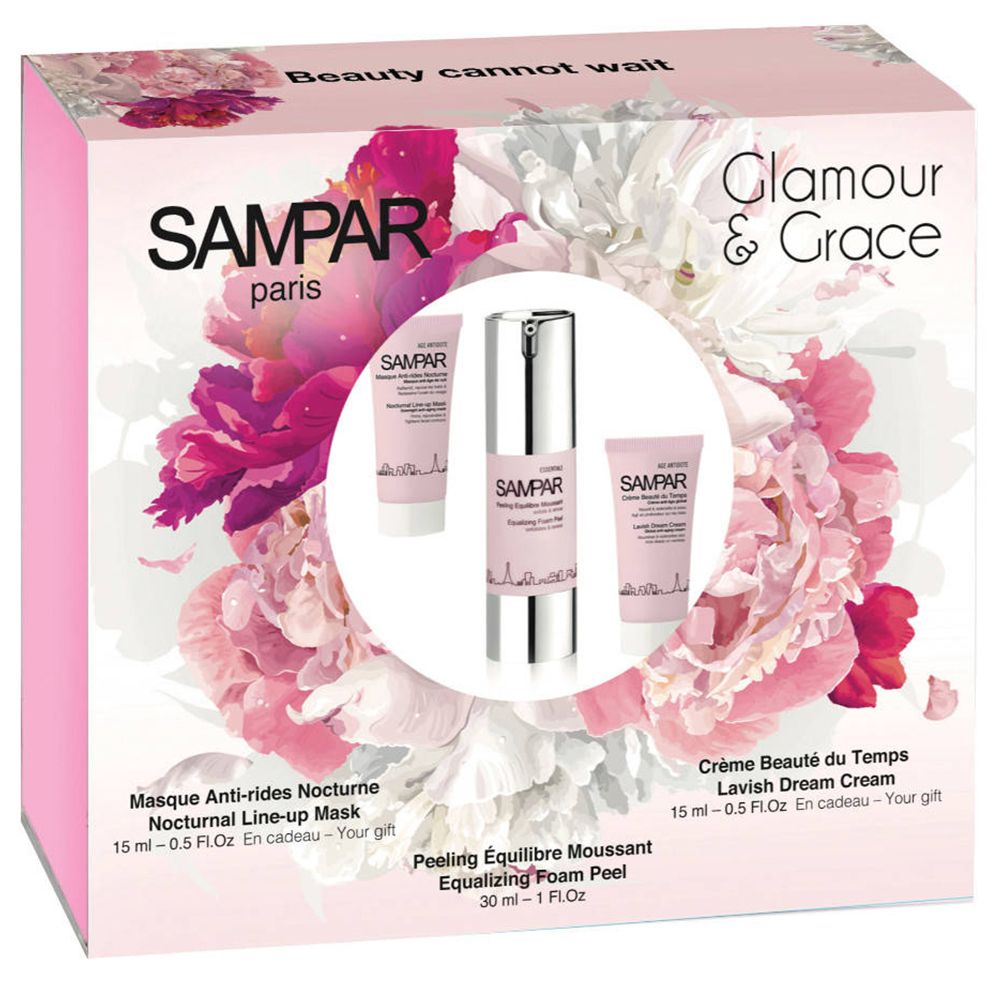 Geschenkbox mit Kosmetikprodukten. Enthält Tuben und eine Flasche. Aufschrift: SAMPAR Paris, Glamour & Grace.