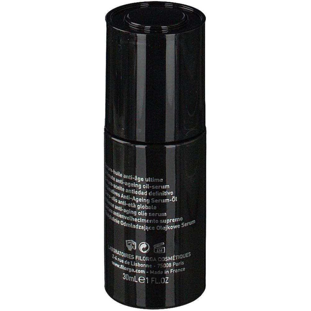 Flacon noir avec texte. Inscription : anti-âge ultime, anti-ageing oil-serum, 30ml 1 fl.oz. Made in France.