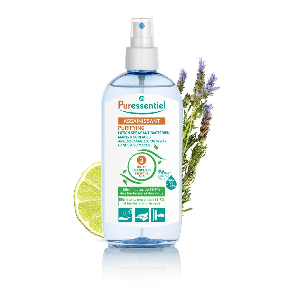 Blauwe transparante fles met verstuiver. Lavendel en limoenpartje ernaast. Opschrift: Puressentiel, Assainissant.