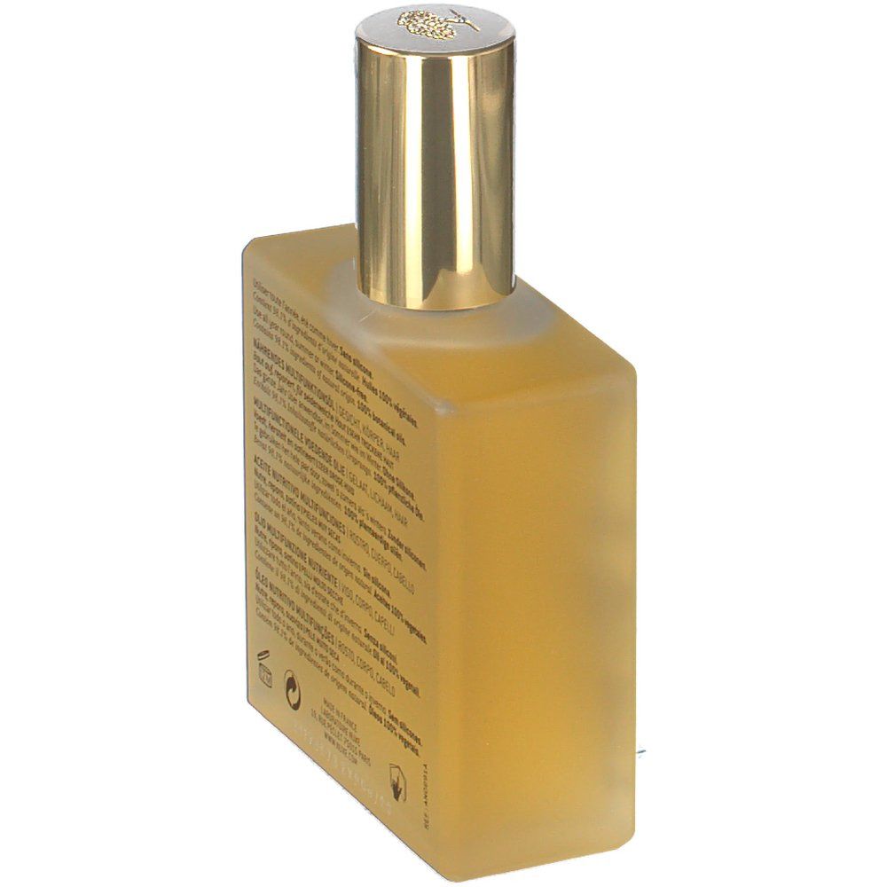 Rückansicht einer quadratischen Glasflasche mit goldfarbenem Verschluss. Text: Inhaltsstoffe, Gebrauchsanweisung.