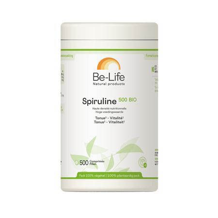 Boîte cylindrique avec couvercle. Inscription: Be-Life Spiruline 500 BIO. 500 comprimés. Design vert et blanc.