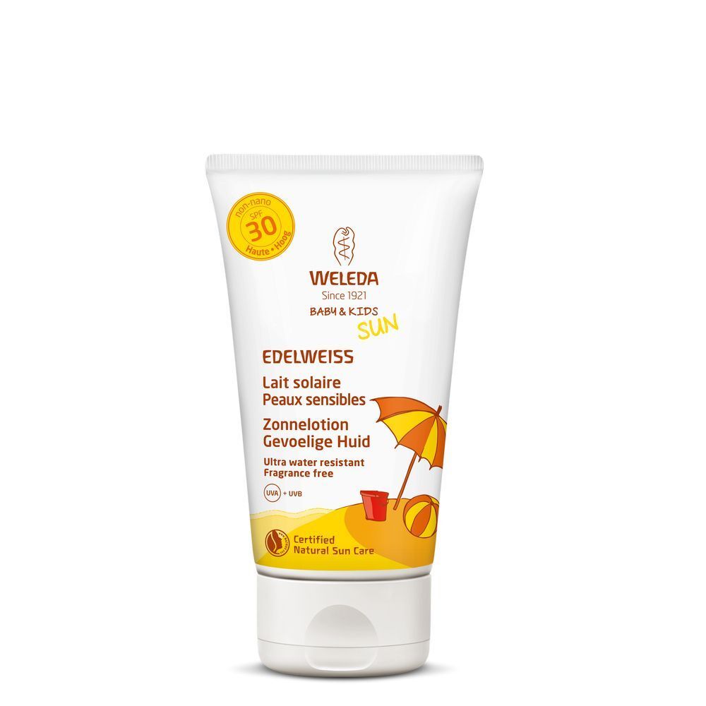 Weiße Tube mit gelb-orangem Aufdruck. Text: Edelweiss, Lait solaire, Zonne lotion. Sonnenschutzfaktor 30. Zertifiziertes Naturkosmetik-Siegel.