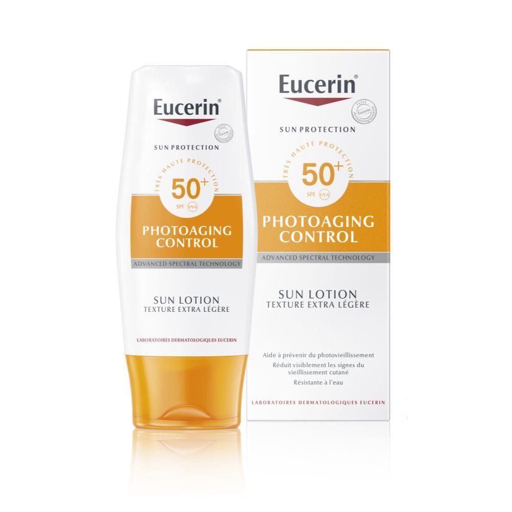 Eucerin Sun Lotion SPF 50+ et son emballage. Flacon blanc avec contenu orange et boîte. Inscription : Photoaging Control.
