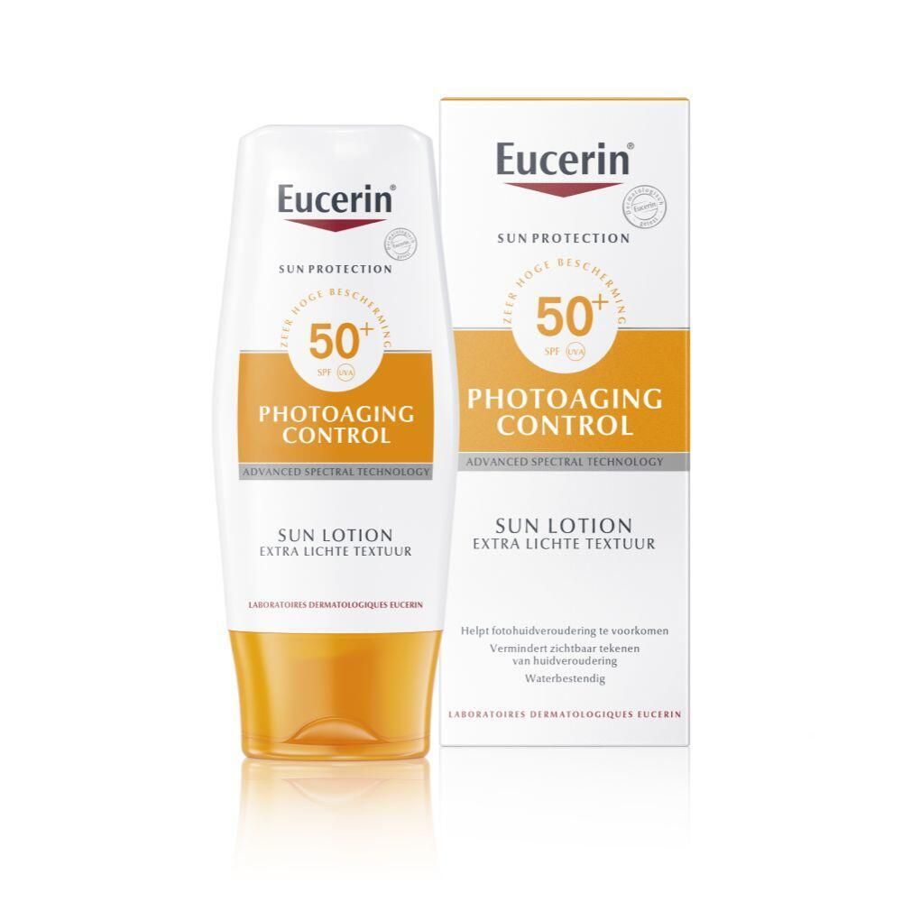 Eucerin Sun Lotion SPF 50+ en verpakking. Witte fles met oranje inhoud en doos. Opschrift: Photoaging Control.