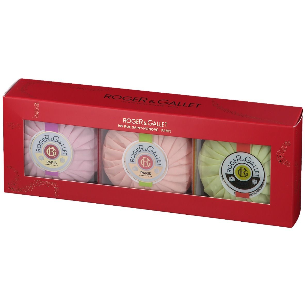 Coffret rouge avec trois savons parfumés. Chaque savon est emballé. Marque Roger & Gallet.