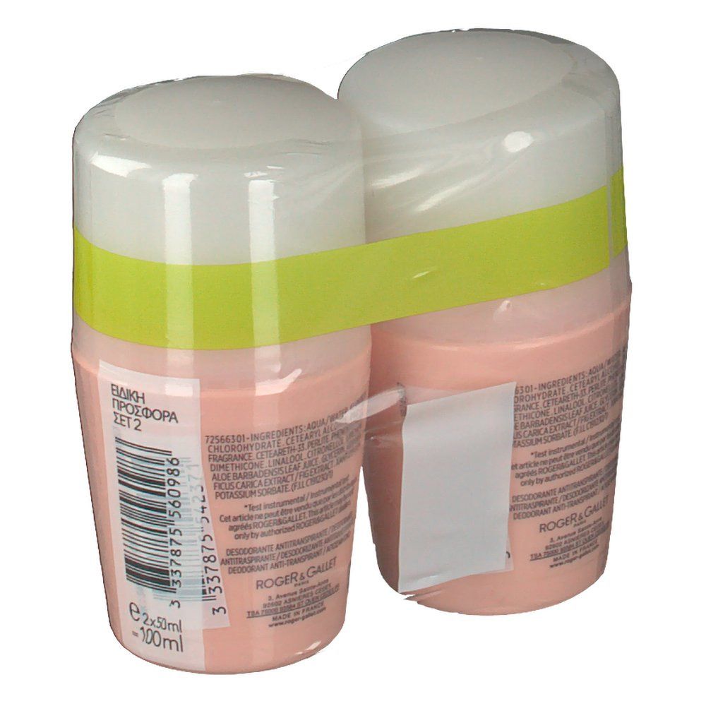 Deux déodorants roll-on roses, couvercles blancs, emballés. Dos avec texte et code-barres. Étiquette Duo-Pack.