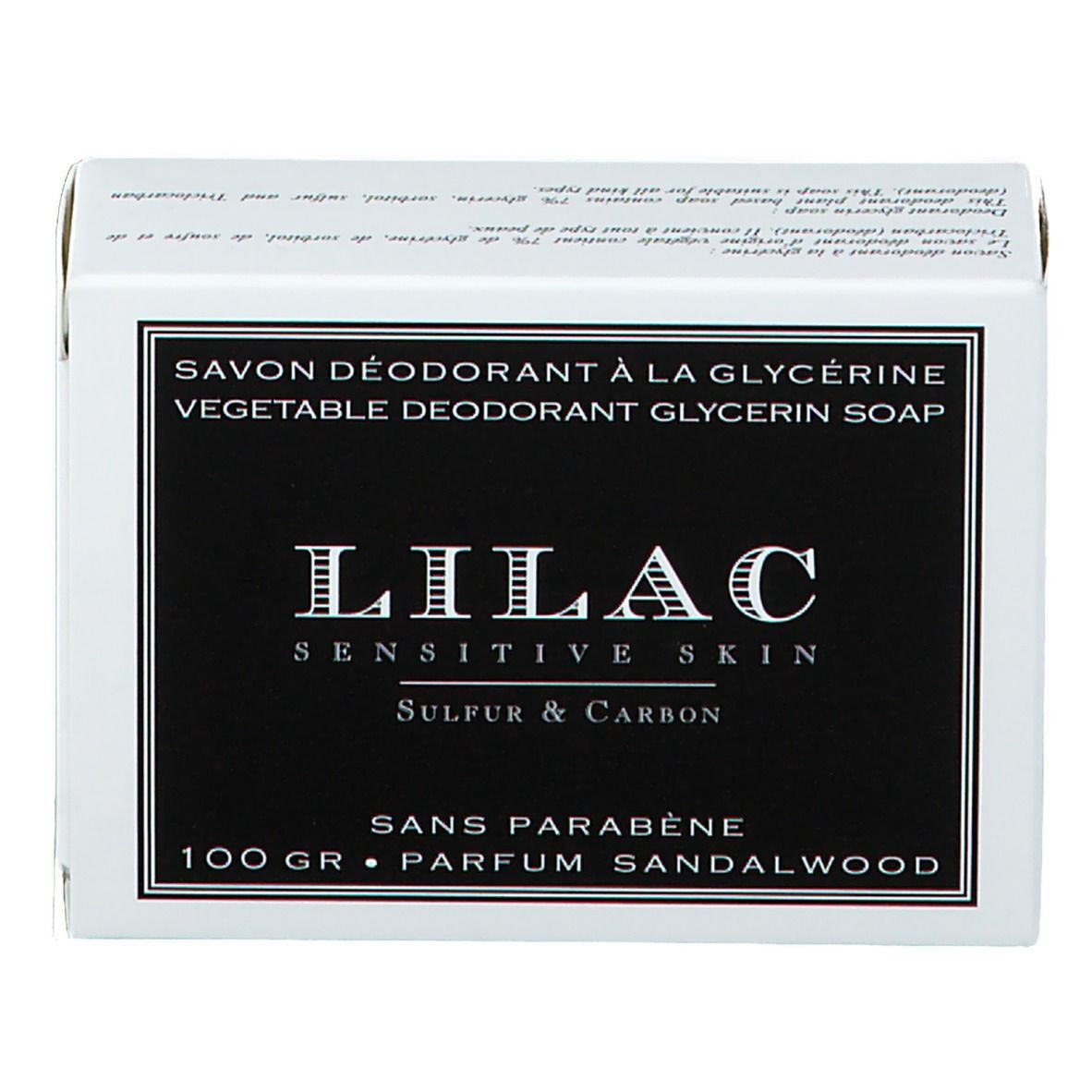 Witte verpakking met zwart etiket. Opschrift: LILAC, Sensitive Skin, Sulfur & Carbon. Tekst: Savon Déodorant à la Glycérine.