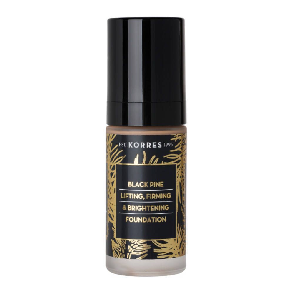 Flacon de maquillage avec bouchon noir. Inscription: Black Pine Lifting, Firming & Brightening Foundation. Marque: Korres.