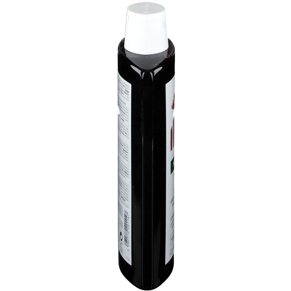 Zwarte fles met witte dop. Etiket met tekst. Perspectiefweergave.