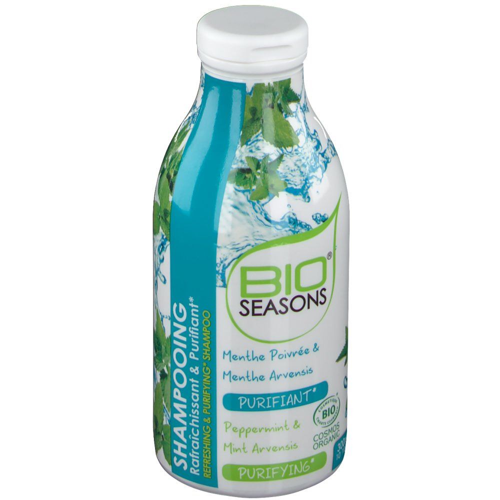 Flacon de shampooing Bio Seasons. Bouchon blanc, flacon bleu et blanc avec logo, texte et illustrations de menthe. Certification bio.