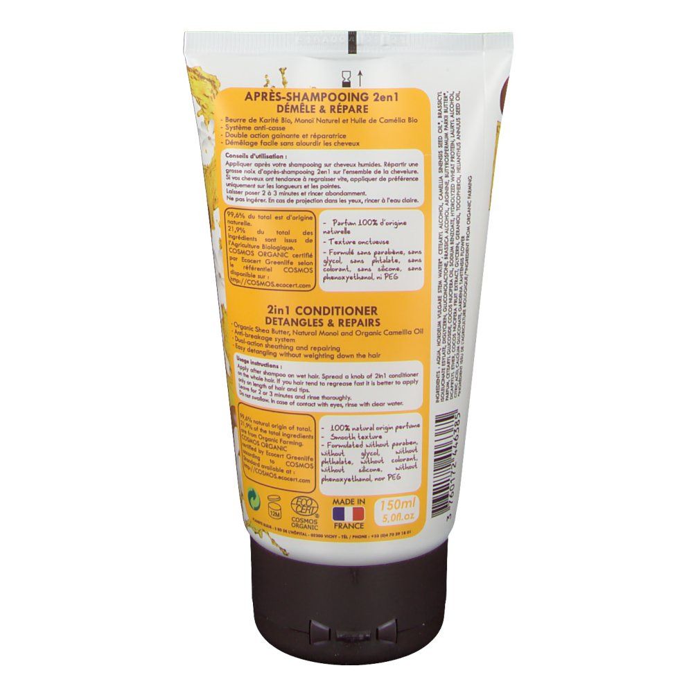 Dos du tube de conditionneur. Texte: 2 en 1 Conditioner, Démêle & Répare. Ingrédients, mode d'emploi. Certification Cosmos Organic.