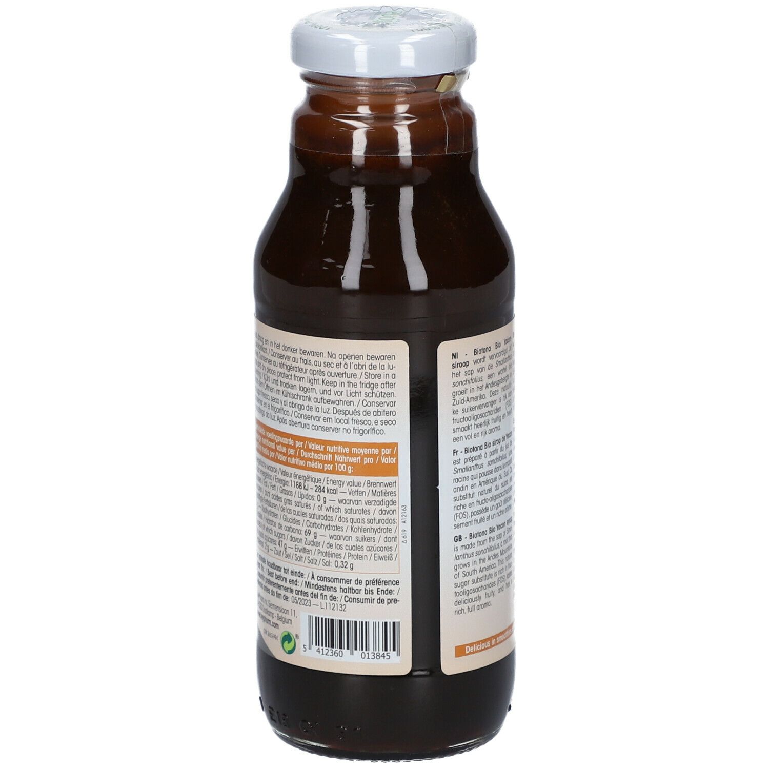 Vue arrière de la bouteille en verre marron. Étiquette avec informations nutritionnelles et origine.
